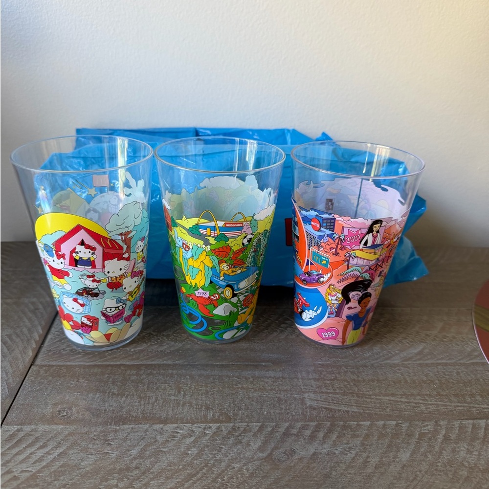 Mc Donald’s Happy Meal 3 glasses. Barbie, Hello Kitty/Snoopy& Beanie babies. $30